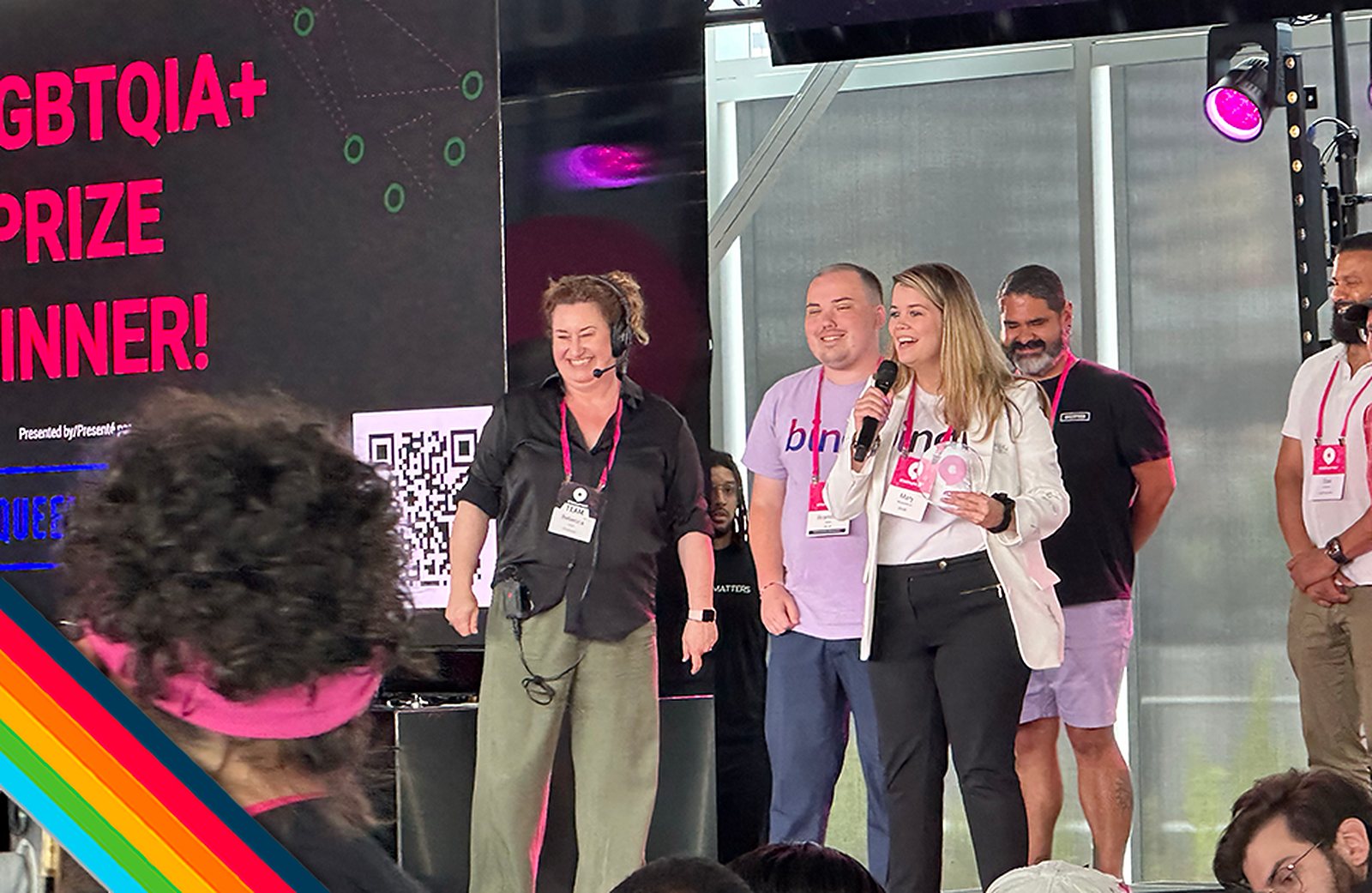 Brandon Teller and Mary Richardson on stage at Startupfest as Bindr is announced prize winner
